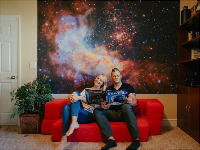 Couple Enjoying their outer space wall mural